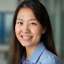 Portrait of Sophia Lee, operations manager, satisfied with logistics services
